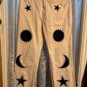 Stylish Women's Cream Pants with Black Star and Moon Design